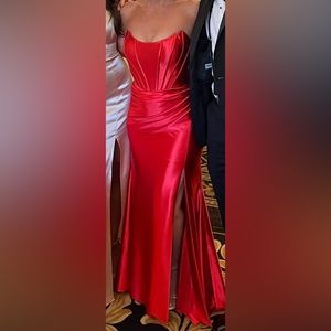 Woman’s red satin gown